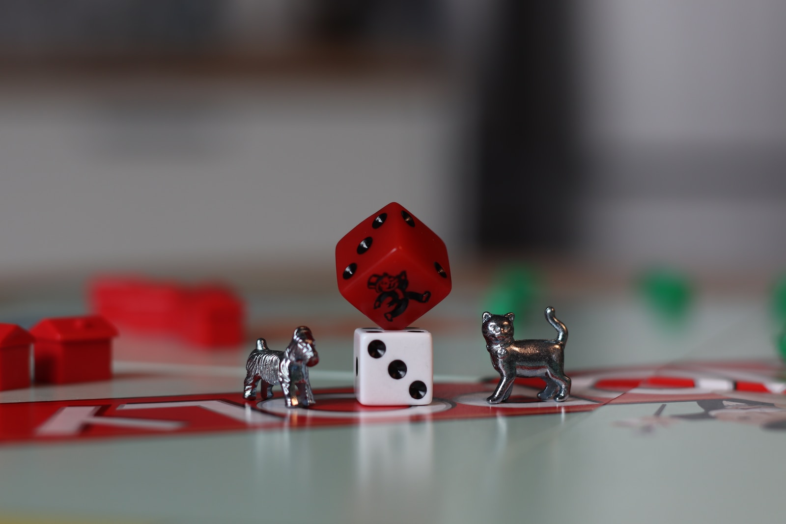 red and silver dice on red table